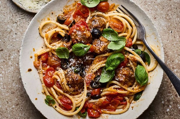 Veggie balls in sun dried tomato sauce with bucatini