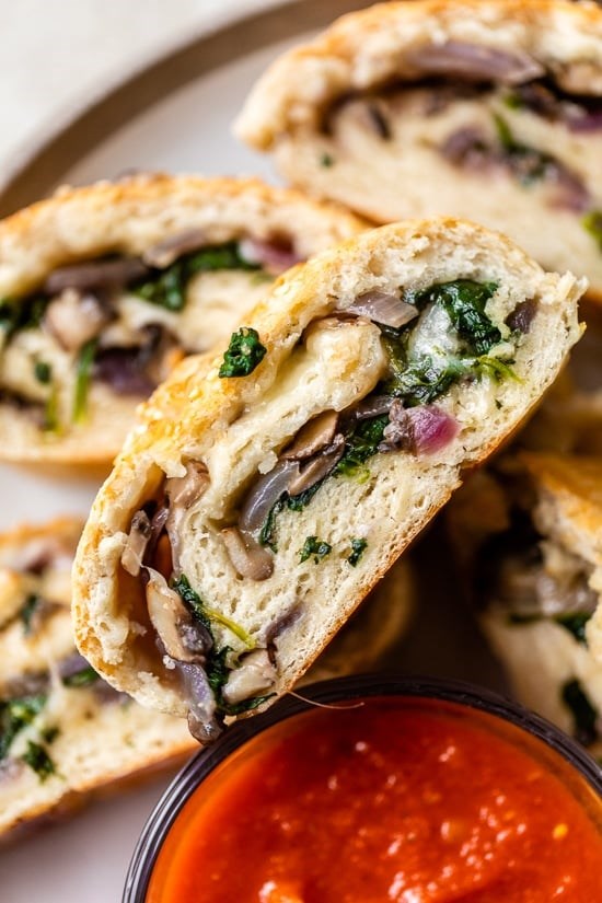 Veggie stromboli with mushroom, spinach and mozzarella