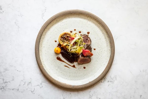 Venison and beetroot with young cabbage and caraway croquettes