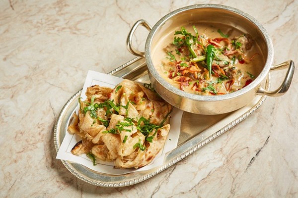 Venison and green peppercorn curry with parathas (Kachi mirch ka gosht)
