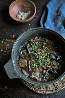 Venison and mushroom stew with chocolate and orange picada