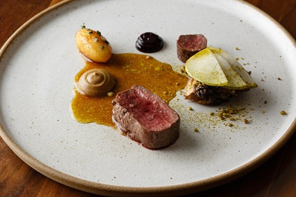 Venison loin, pear, spruce