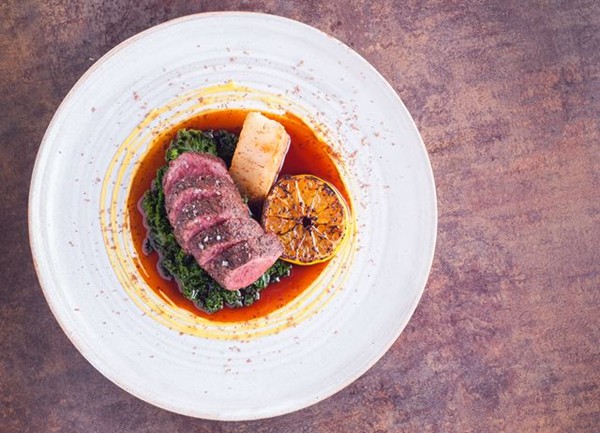 Venison loin with juniper, potato rösti and charred clementine 