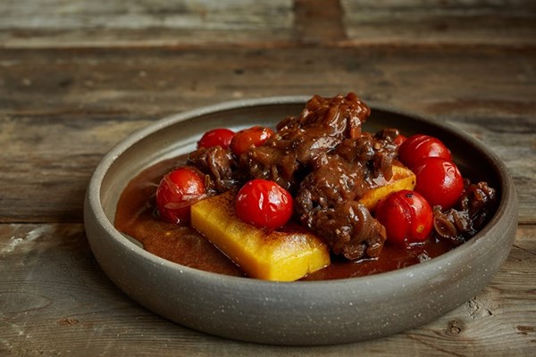 Venison, Piccolo cherry tomato and rosemary ragù with grilled polenta