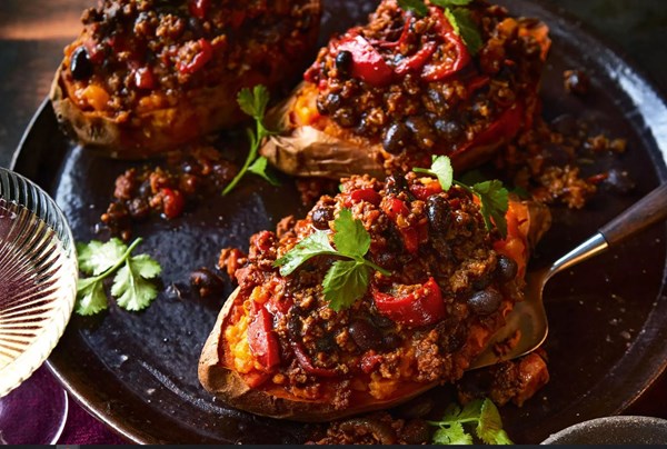 Venison, red pepper & black bean chilli, with baked sweet potatoes