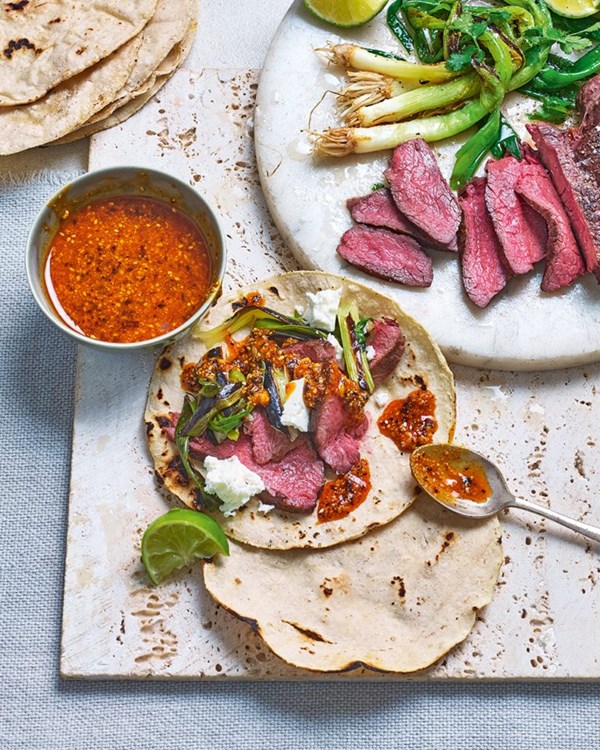 Venison tacos with grilled spring onions & peanut salsa