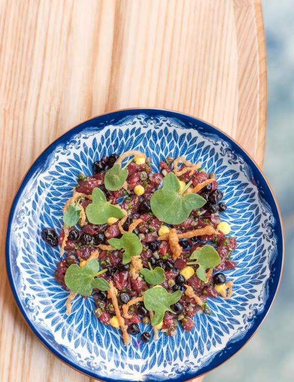 Venison tartare with blueberries and juniper