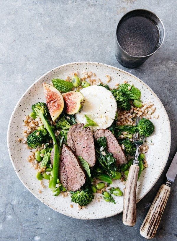 Venison with goat's cheese, figs and honey on a farro and broad bean salad