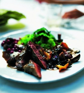 Venison with wild mushrooms, chestnuts and cranberries