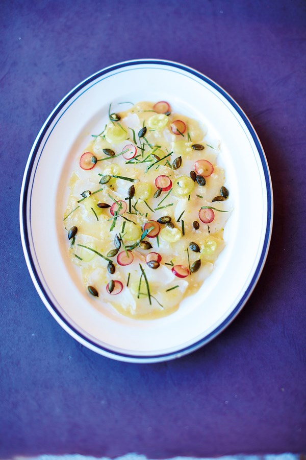 Verjus-cured monkfish with pumpkin seeds and grape dressing