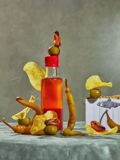 Vermouth hour potato chips with mussels, olives & piparras
