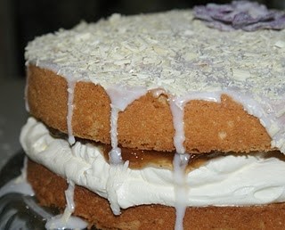 Victoria sponge cake with cardamom rose cream & rhubarb