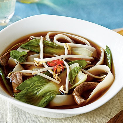 Vietnamese beef-noodle soup with Asian greens