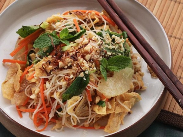 Vietnamese citrus and noodle salad with fresh herbs and fried yuba (Tofu skin)