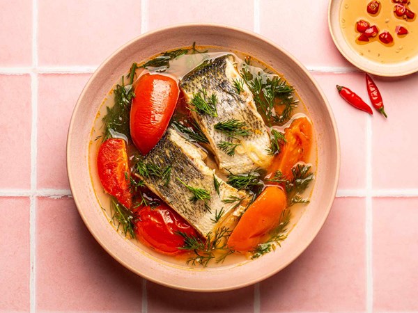 Vietnamese fish soup with tomato and dill (Canh chua cá thì là)