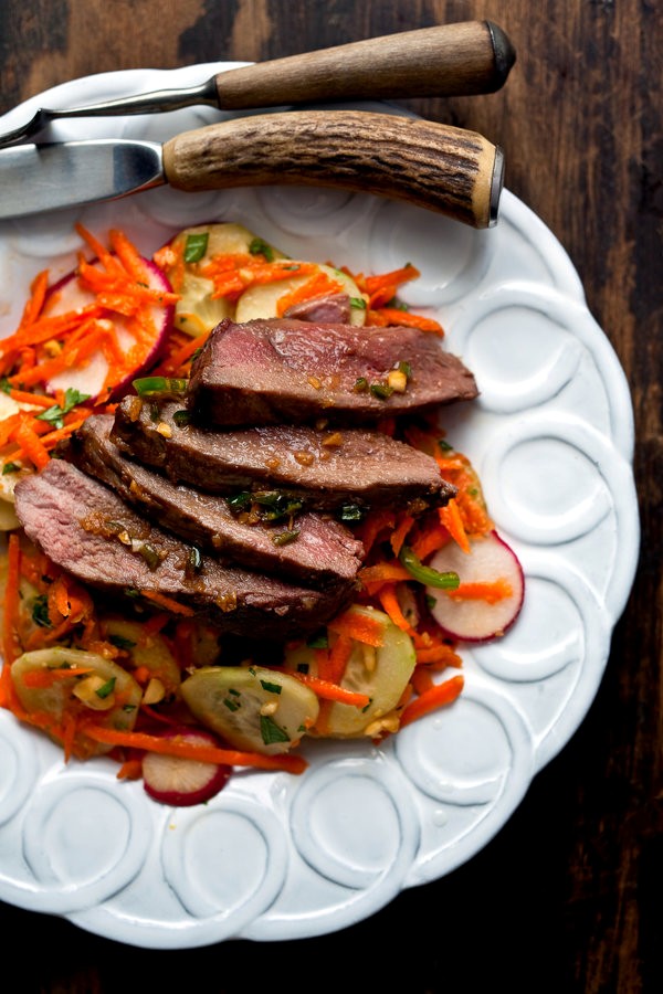 Vietnamese grilled duck salad with cucumbers, radishes and peanuts
