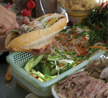 Vietnamese sandwich with grilled porky pâté, pickled veggies (Bánh mì thịt)