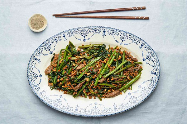 Vietnamese sautéed morning glory with beef (Rau muống xào thịt bò)