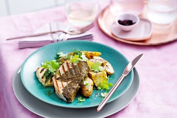 Vine leaf swordfish with kipflers and haloumi
