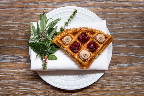 Waffles with chicken liver parfait and red wine shallots