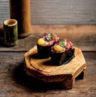 Wagyu beef gunkan maki and miso-cured quail yolk