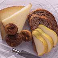 Walnut and rye bread with cheese, pears and honeyed figs