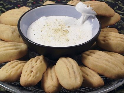 Walnut biscuits with marshmallow dip (Karrabeej ma natef)