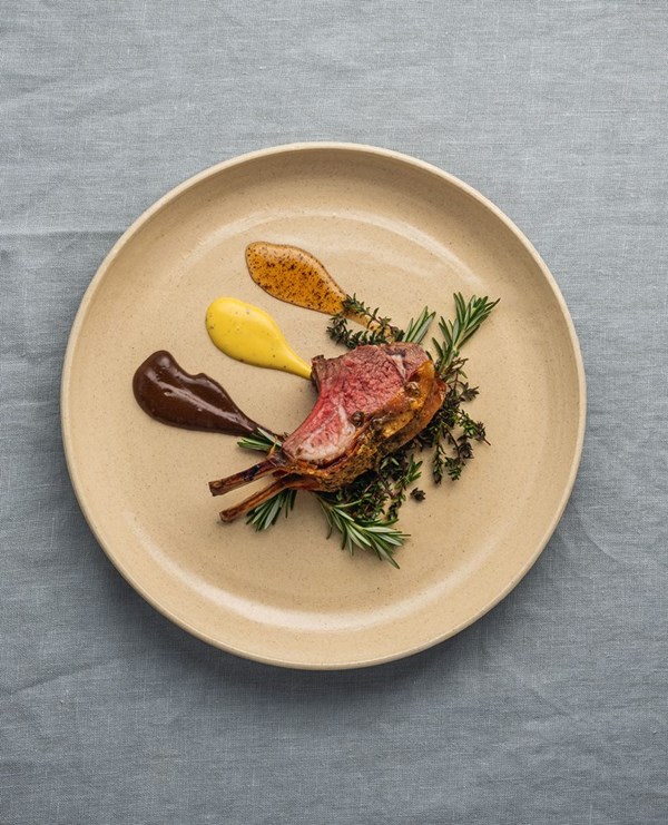Walnut-crusted rack of lamb with prosciutto & kawakawa jelly