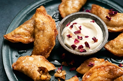 Walnut-stuffed pancakes (Qatayef bil-joz)