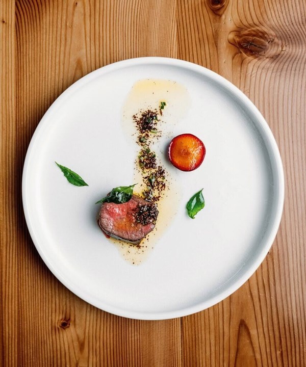Wapiti venison loin with roasted plum & spiced butter