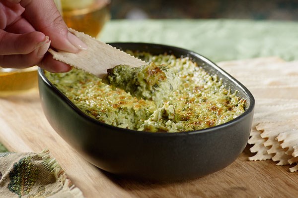 Warm artichoke, kale and spinach cheesy dip