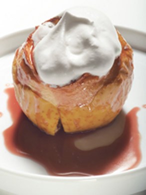 Warm baked apples with cranberry-caramel sauce