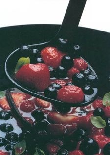 Warm berry compote with basil