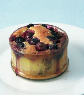 Warm blueberry puddings with crème de cassis