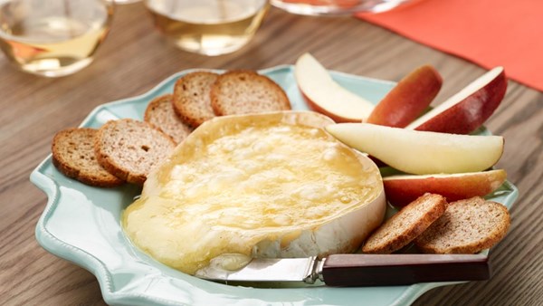 Warm Brie with Fuji apple, pear, and melba rounds