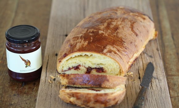 Warm brioche roll with quince conserve