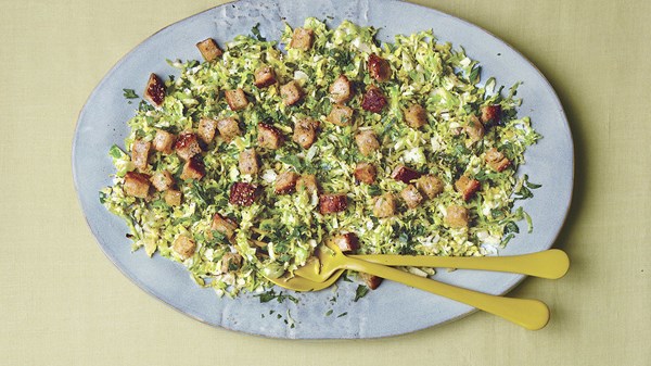 Warm Brussels sprout Caesar salad with multigrain croutons