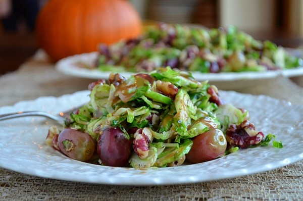 Warm Brussels sprouts salad with roasted grapes and walnuts
