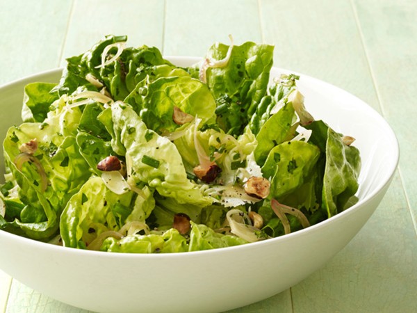 Warm butter lettuce salad with hazelnuts