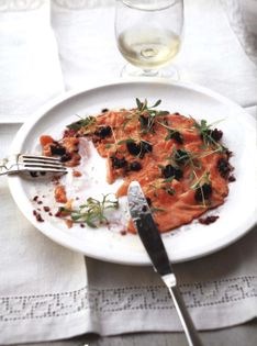 Warm carpaccio of organic Scottish salmon with spiced shallot vinaigrette