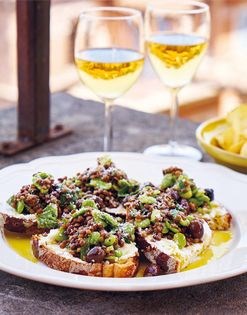 Warm Castelluccio lentils on toast with favas, mint and chèvre