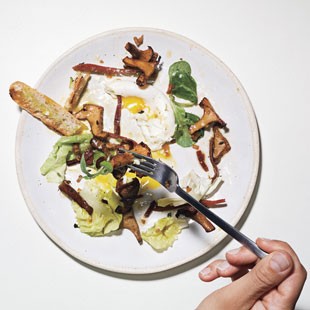 Warm chanterelle salad with speck and poached eggs