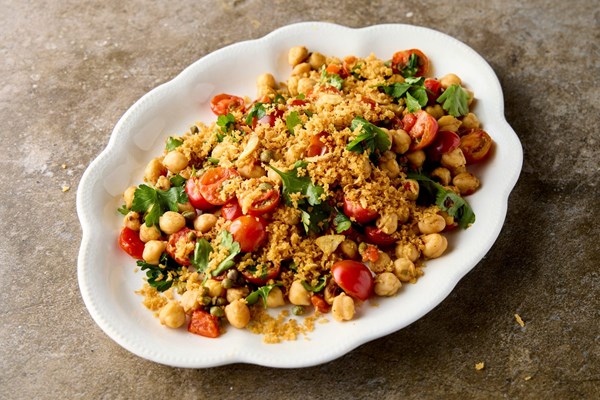 Warm chickpea salad with tomatoes, capers and toasted breadcrumbs