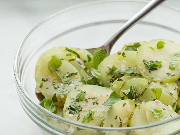 Warm cucumbers with spring herbs