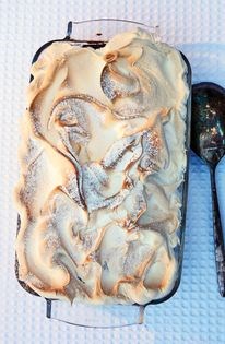 Warm custard pudding with banana, Belgian waffles & meringue
