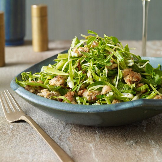 Warm escarole salad with snow peas and sausage