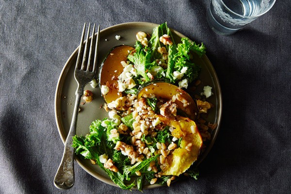 Warm farro and mustard green salad with maple-roasted acorn squash