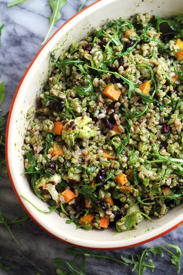 Warm farro bowl with roasted vegetables and a kale pesto vinaigrette