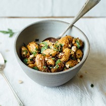 Warm fingerling potatoes with garlic-turmeric sauce