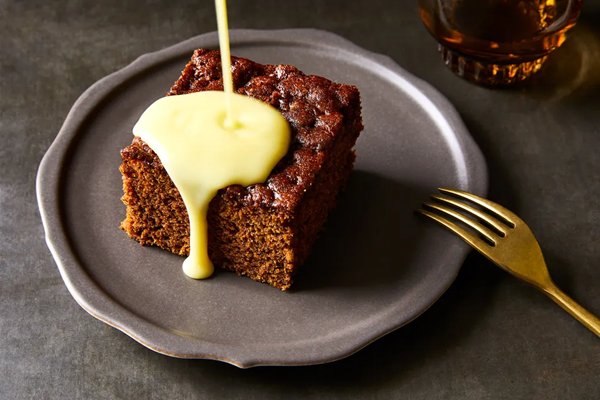 Warm gingerbread cake with crème Anglaise